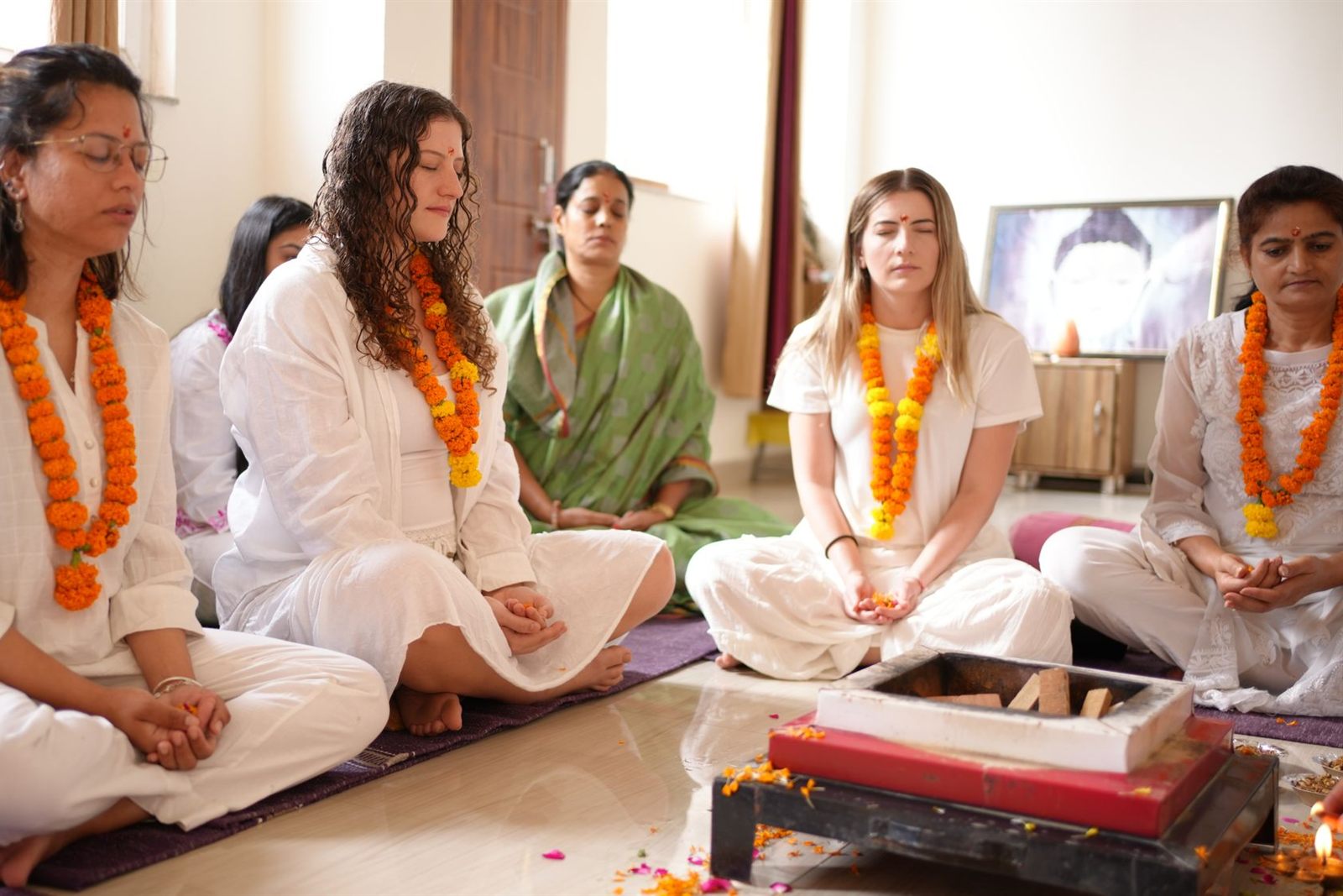 Group meditation session at an Ayurveda wellness event